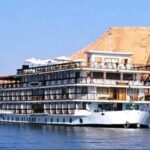 Dinner cruise on the Nile River with live music and entertainment under the night sky in Egypt.