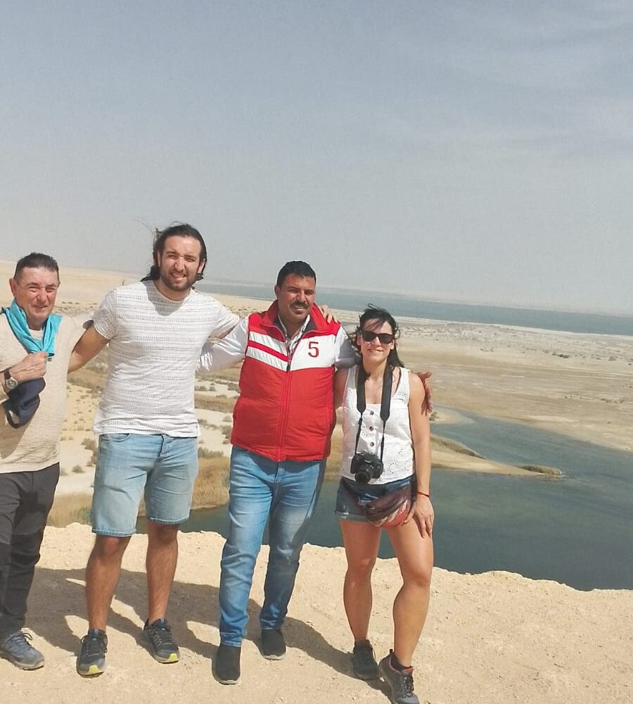 Wadi El Rayan waterfalls in Fayoum, Egypt, cascading into a natural pool in the desert.